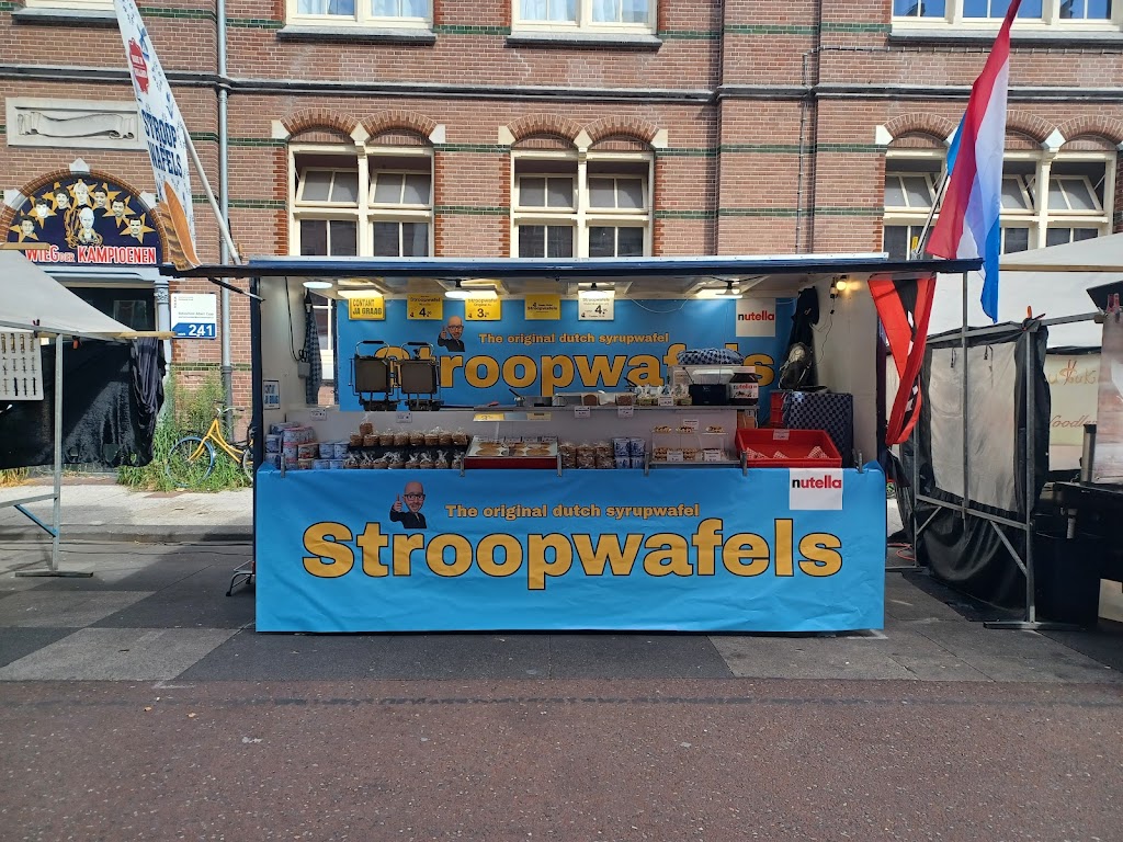 Happy wafel StroopWafels. De originele Stroopwafels. Albert Cuypmarkt Amsterdam